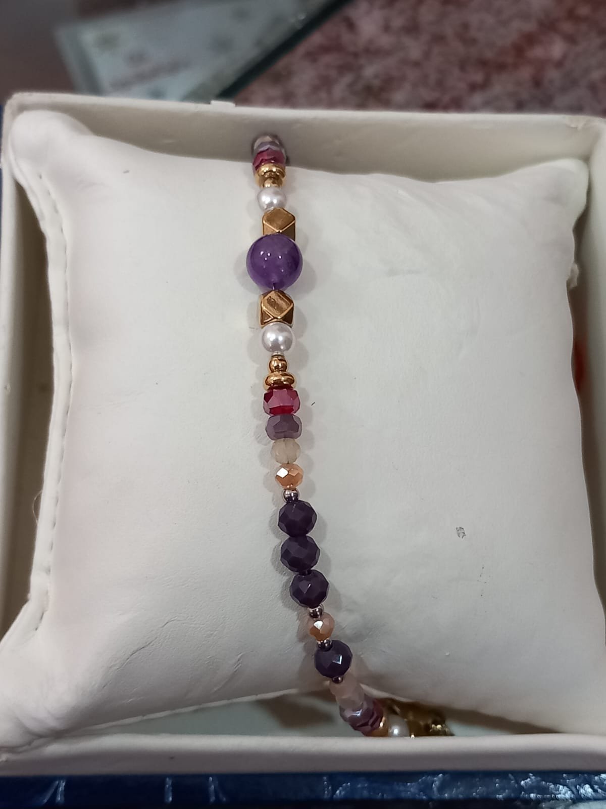 Bracciale in Acciaio con Pietre Viola e Oro – Design Raffinato e Luminoso